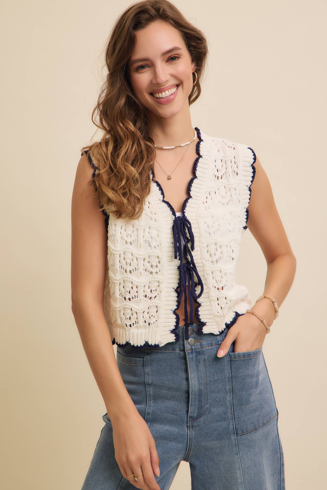 CROCHET SWEATER VEST WITH SCALLOP AND BOW DETAILS